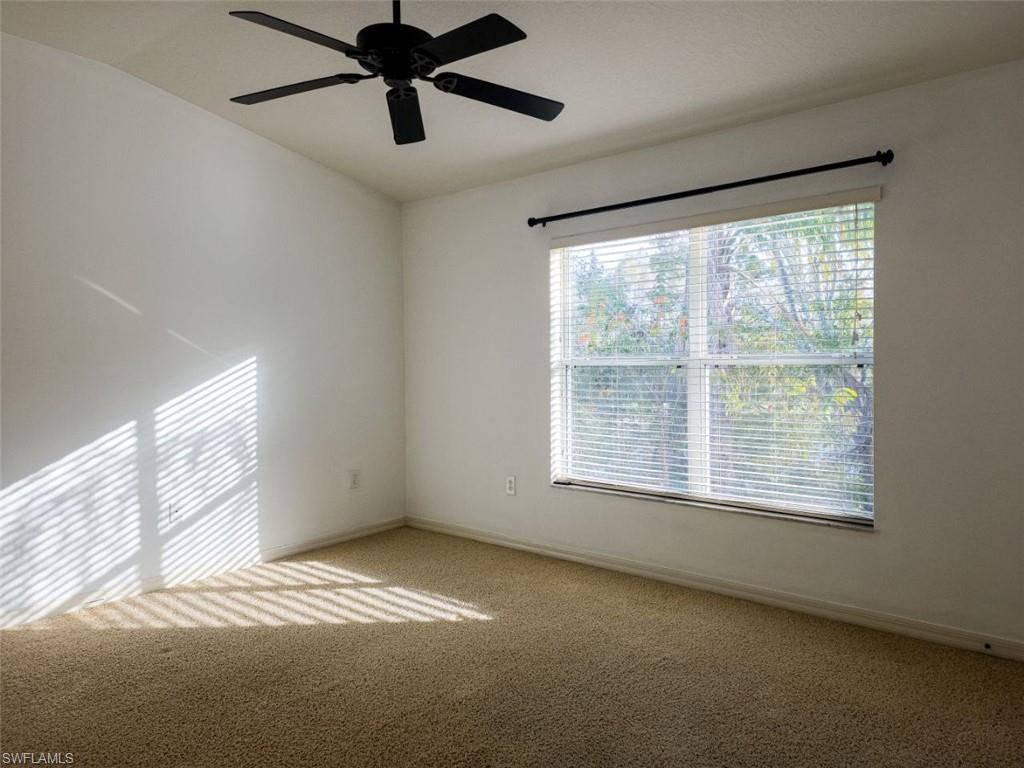 1044 Sleepy Oak Drive Zephyrhills, FL 33543 - Photo 16 of 19 a view of an empty room with a window