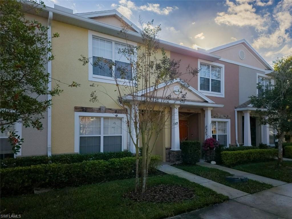 1044 Sleepy Oak Drive Zephyrhills, FL 33543 - Photo 2 of 19 a front view of a house with garden
