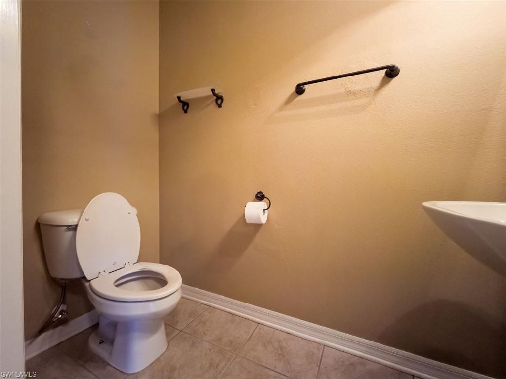 1044 Sleepy Oak Drive Zephyrhills, FL 33543 - Photo 5 of 19 a bathroom with a toilet