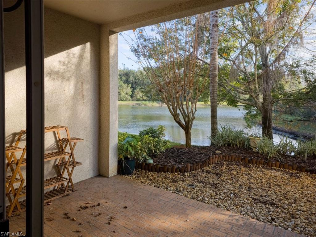 1044 Sleepy Oak Drive Zephyrhills, FL 33543 - Photo 8 of 19 a front view of a house with garden