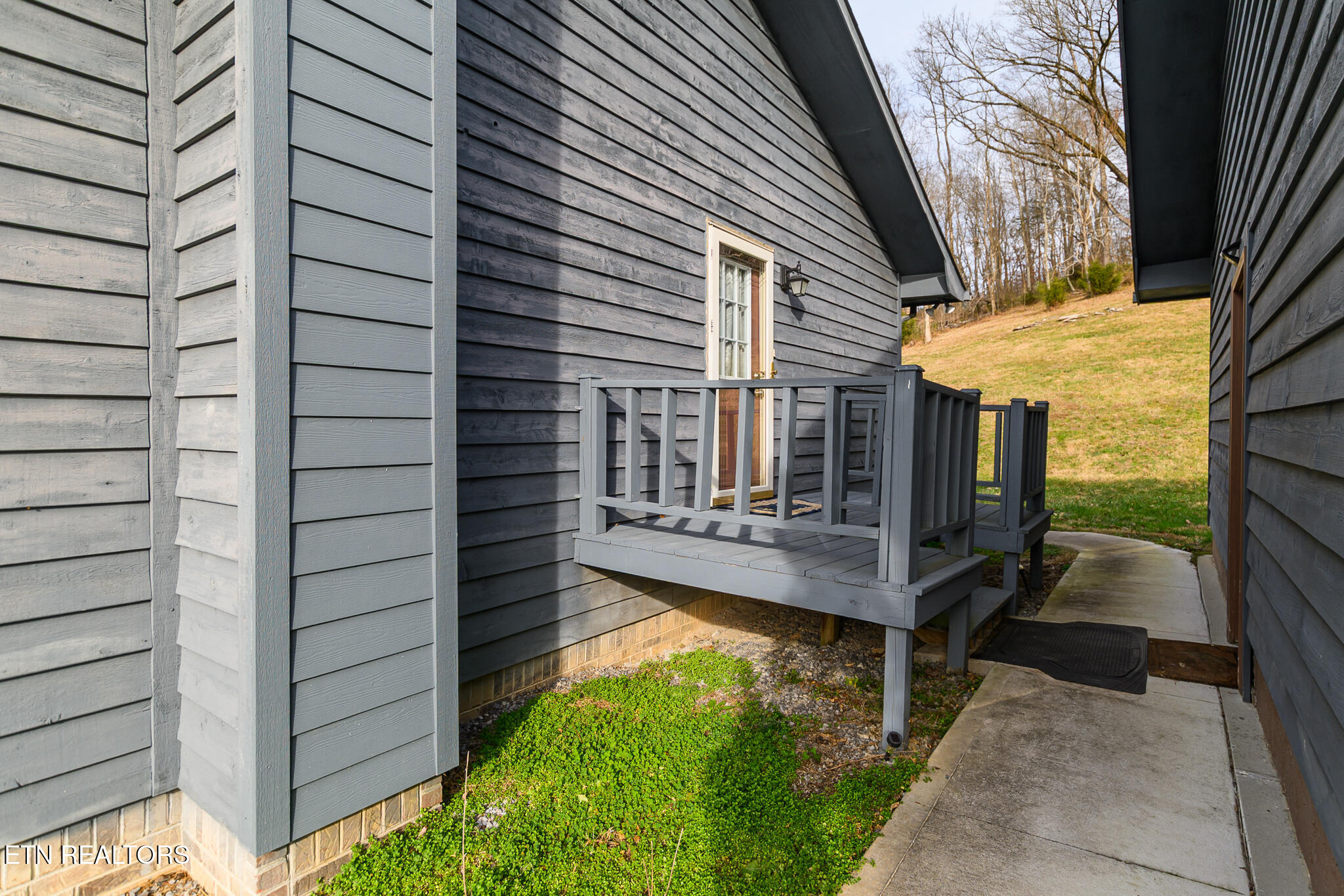 227 Lone Ridge Lane Clinton, TN 37716 - Photo 40 of 58 Upstairs walkway from Garage to house