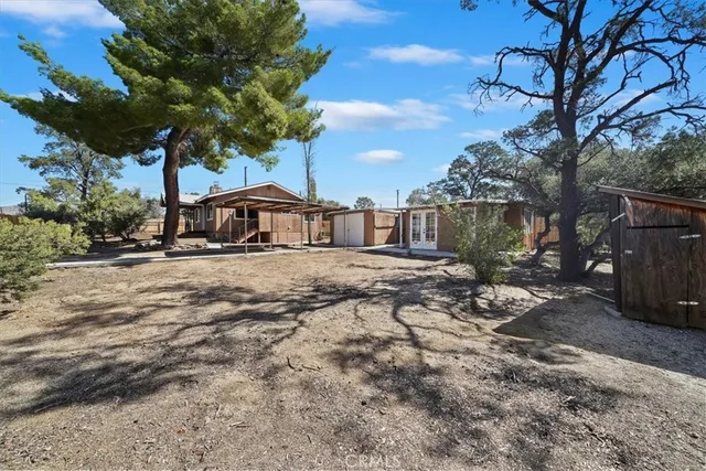 a house with trees in front of it