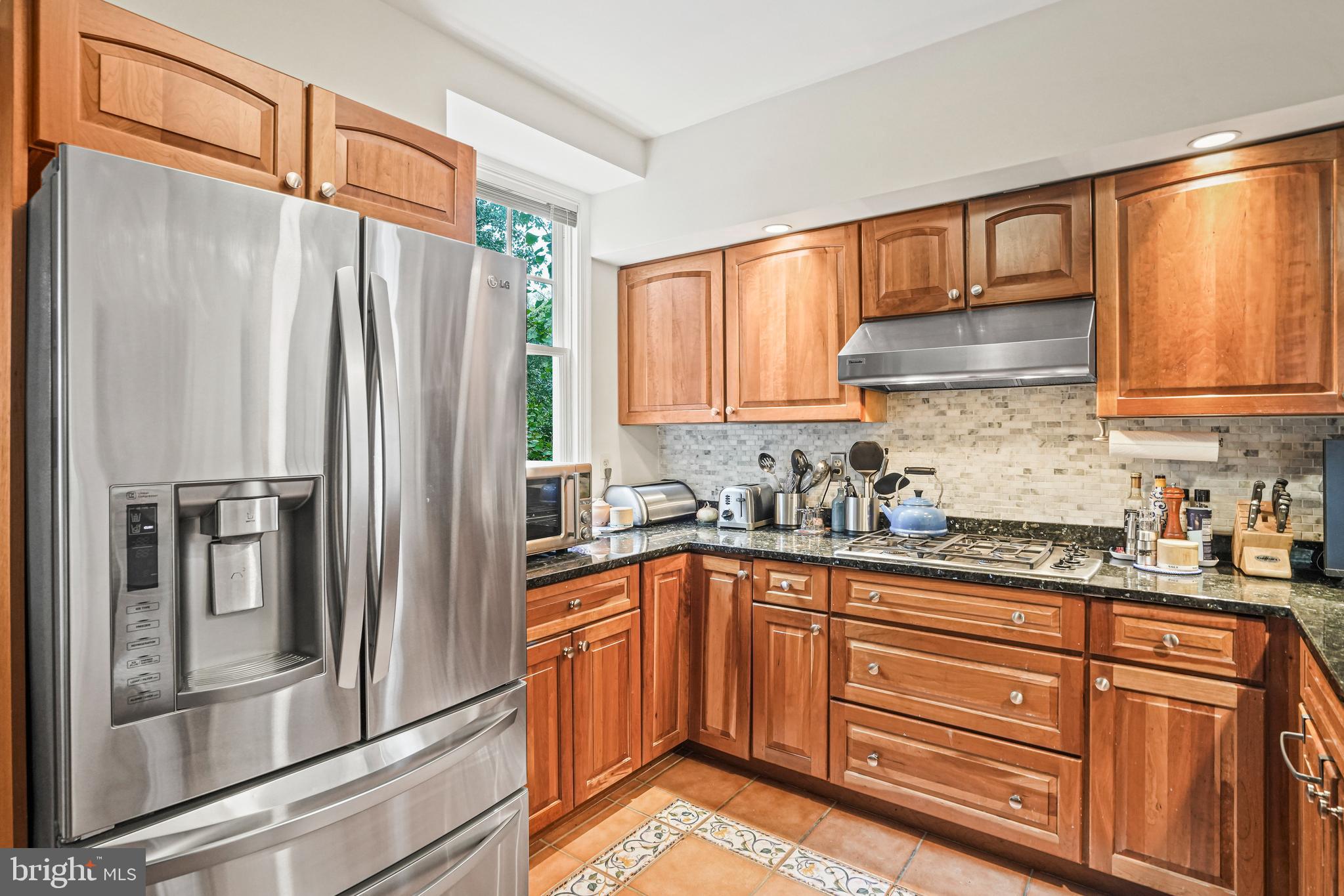 3740 Oliver Street Northwest Washington, DC 20015 - Photo 12 of 40 Kitchen with stone countertops