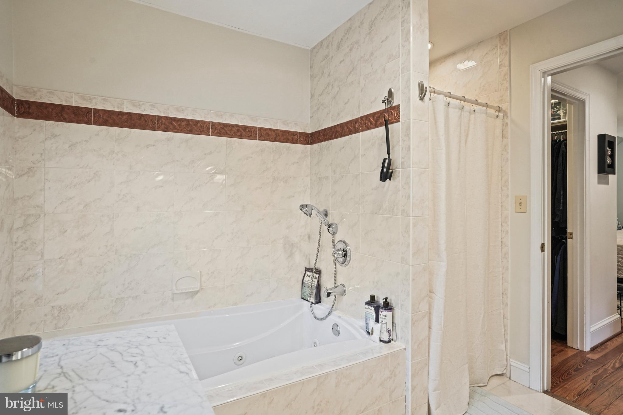 3740 Oliver Street Northwest Washington, DC 20015 - Photo 18 of 40 Primary bath with tub and separate shower