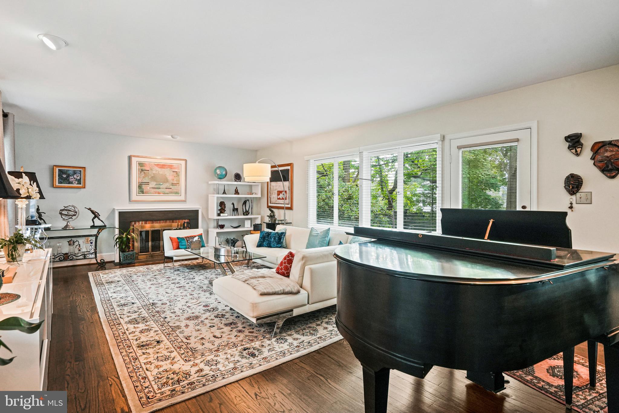 3740 Oliver Street Northwest Washington, DC 20015 - Photo 6 of 40 Living room with fireplace and space for piano