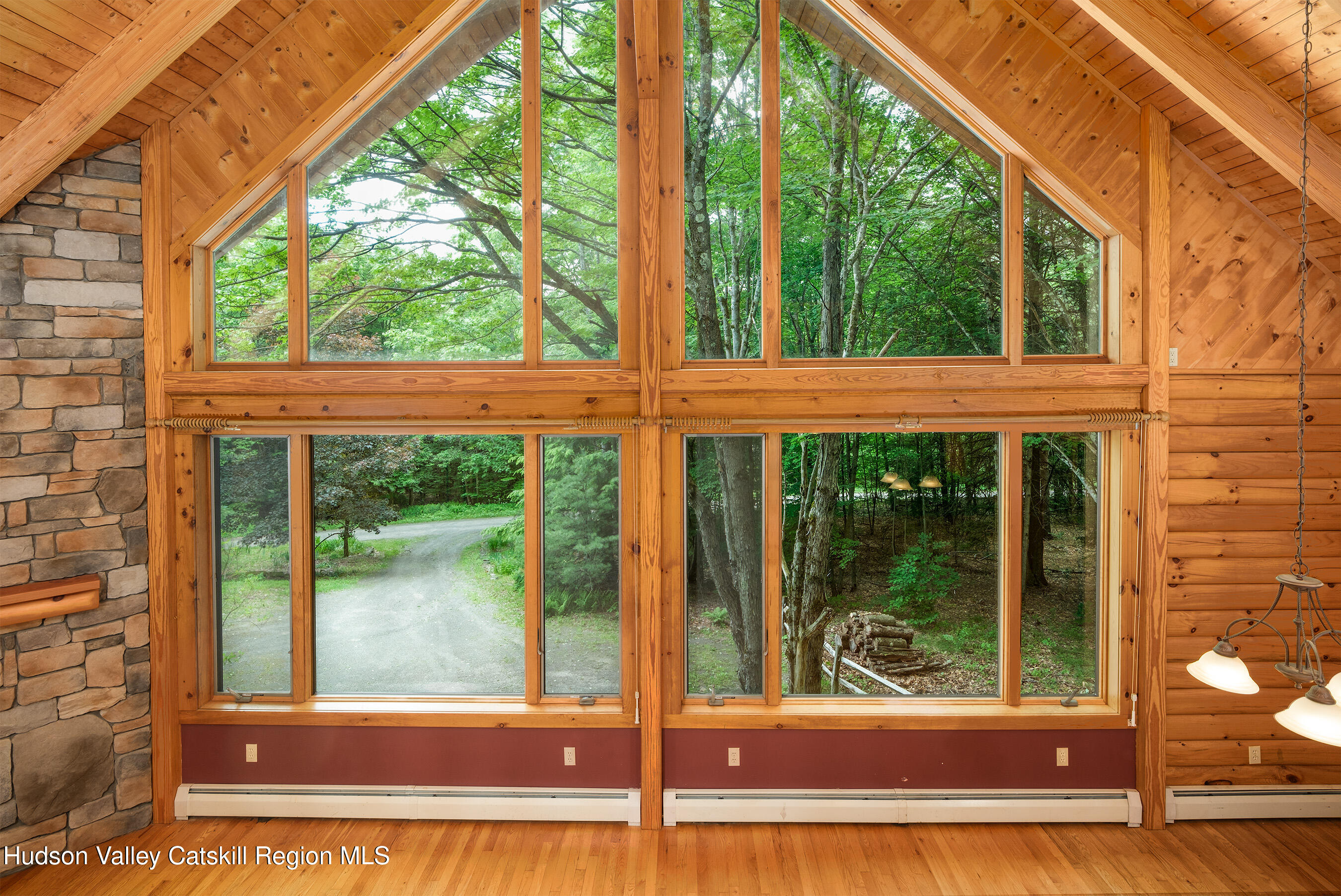 135 Sparrowhawk Lake Road Schenevus, NY 12155 - Photo 15 of 71 014 - Wall of Glass Greatroom - 135 Spar