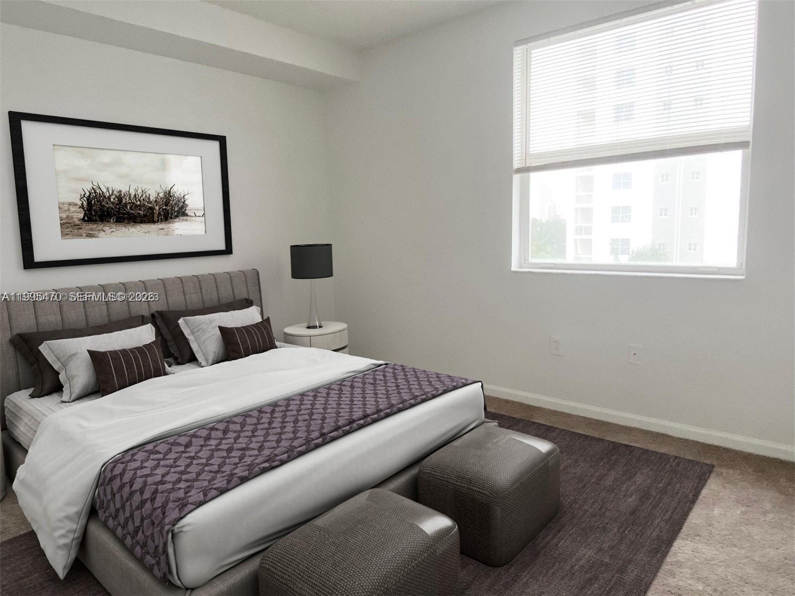 17100 North Bay Road, Unit 1604 Sunny Isles Beach, FL 33160 - Photo 18 of 37 a bedroom with bed and window