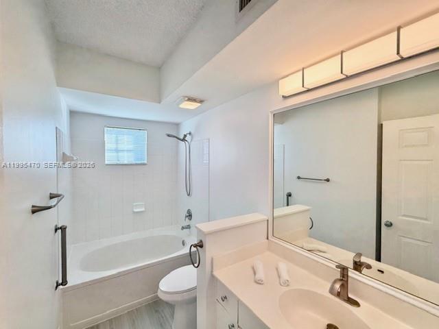 17100 North Bay Road, Unit 1604 Sunny Isles Beach, FL 33160 - Photo 24 of 37 a bathroom with a sink a toilet and shower