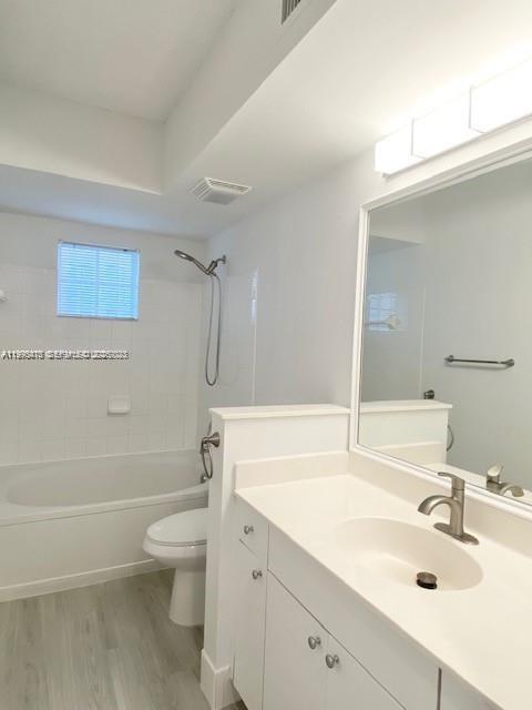 17100 North Bay Road, Unit 1604 Sunny Isles Beach, FL 33160 - Photo 25 of 37 a bathroom with a sink a toilet and shower
