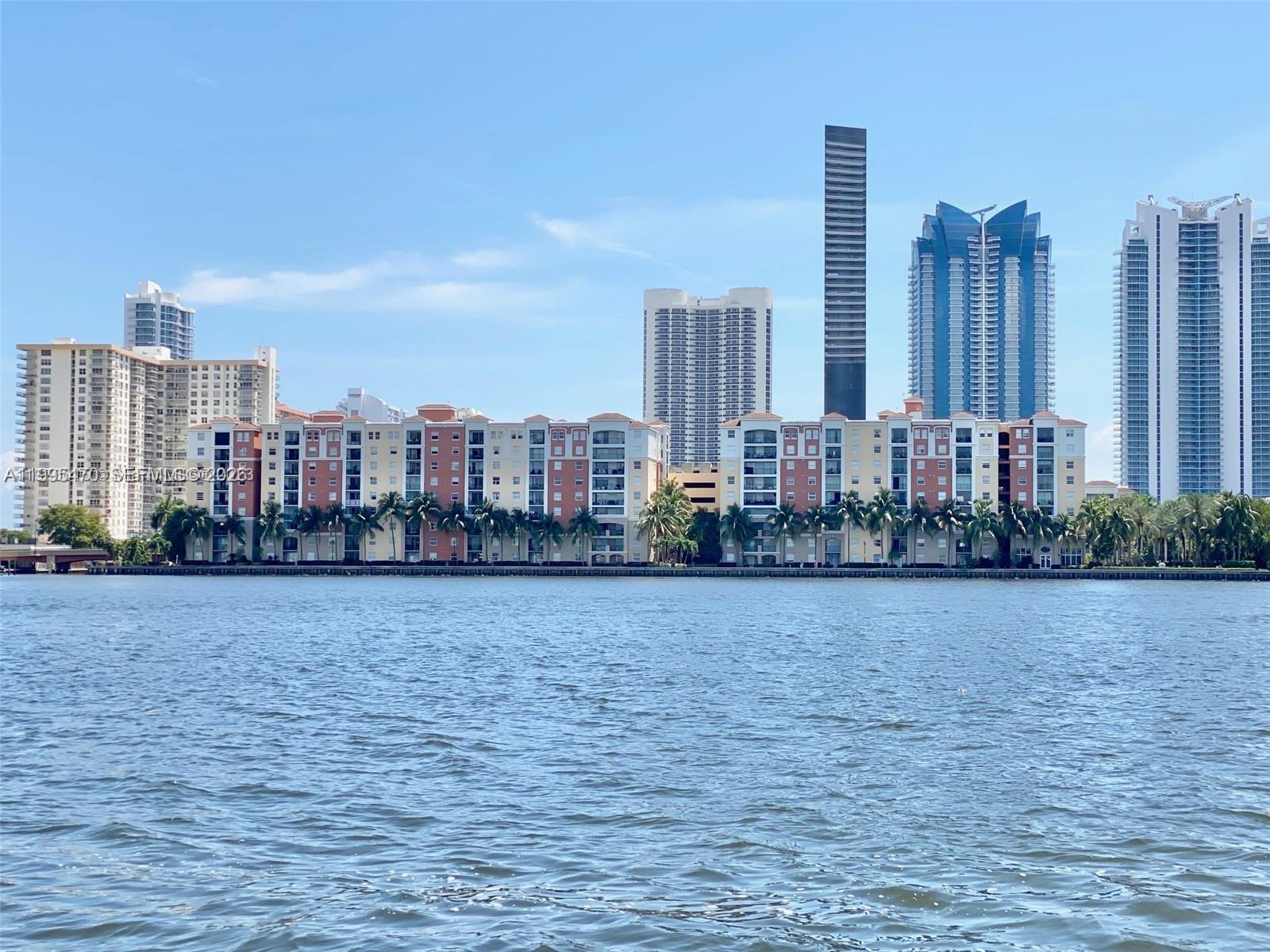 17100 North Bay Road, Unit 1604 Sunny Isles Beach, FL 33160 - Photo 36 of 37 a view of a city with tall buildings