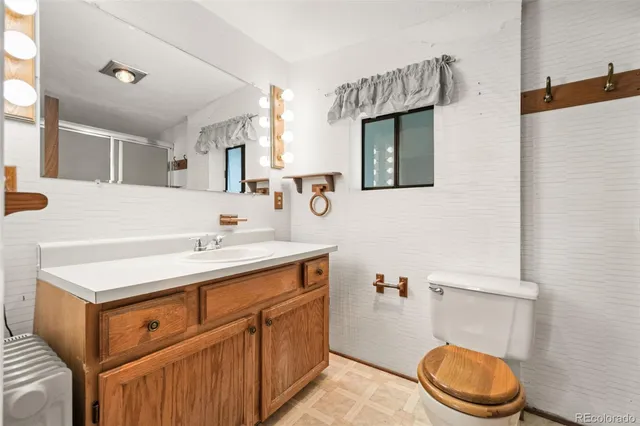 a kitchen with stainless steel appliances granite countertop a sink and a cabinets