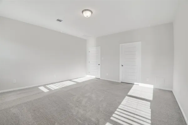 an empty room with an entryway