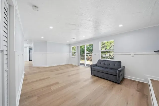 a room with a bed and a window