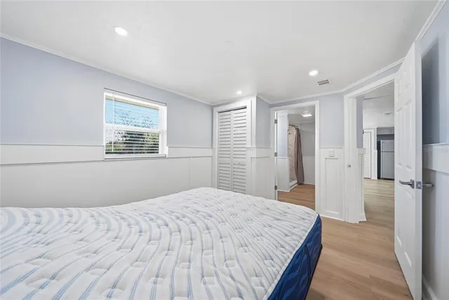 a bathroom with a sink a mirror and shower