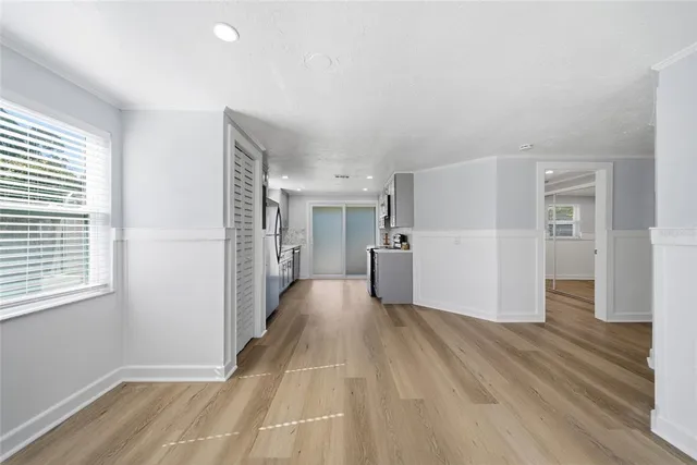 a kitchen with stainless steel appliances a refrigerator and a sink