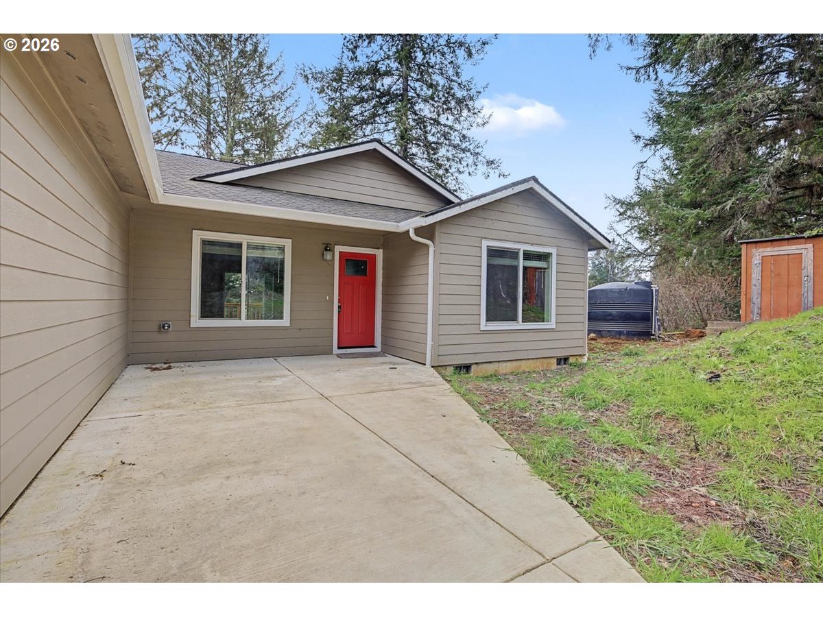 9 North Moolack Way Otis, OR 97368 - Photo 2 of 38 a view of house with yard