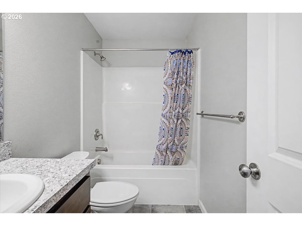 9 North Moolack Way Otis, OR 97368 - Photo 25 of 38 a bathroom with a granite countertop sink toilet and shower