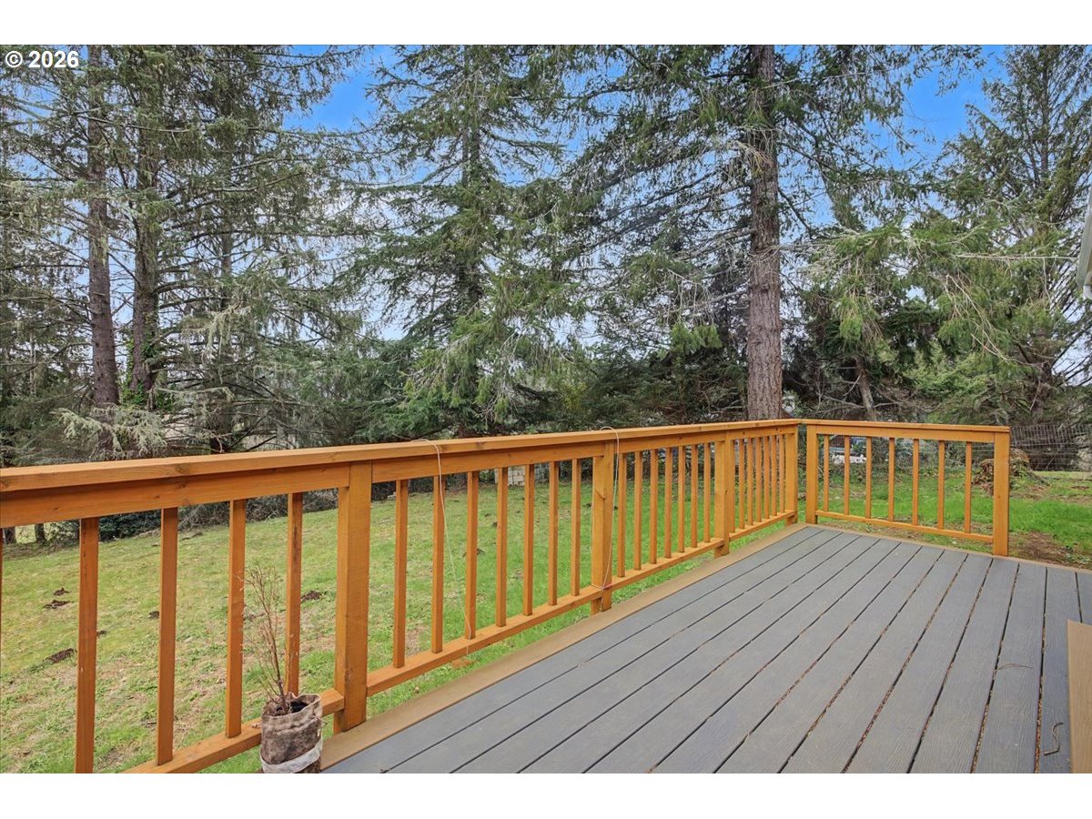 9 North Moolack Way Otis, OR 97368 - Photo 31 of 38 a view of balcony with wooden floor