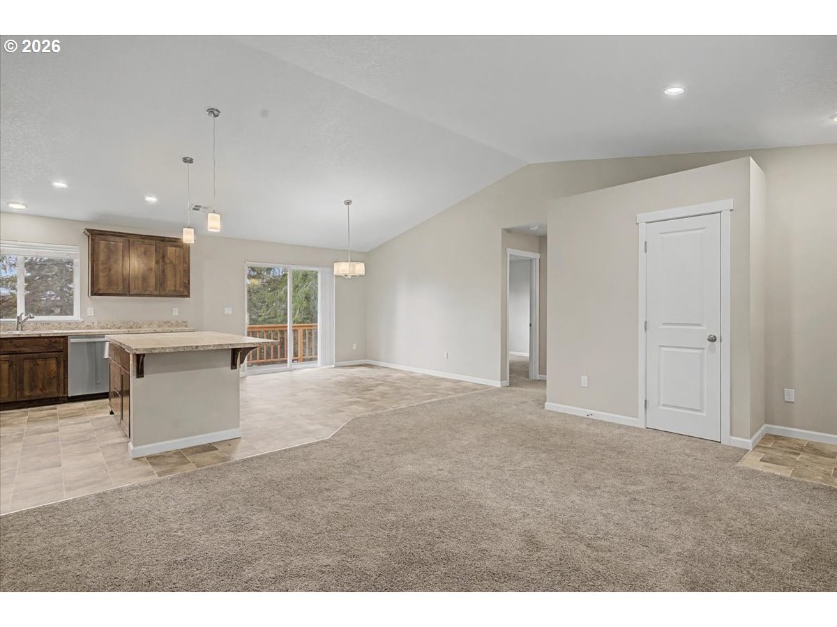 9 North Moolack Way Otis, OR 97368 - Photo 4 of 38 a view of a kitchen with a sink and a large window