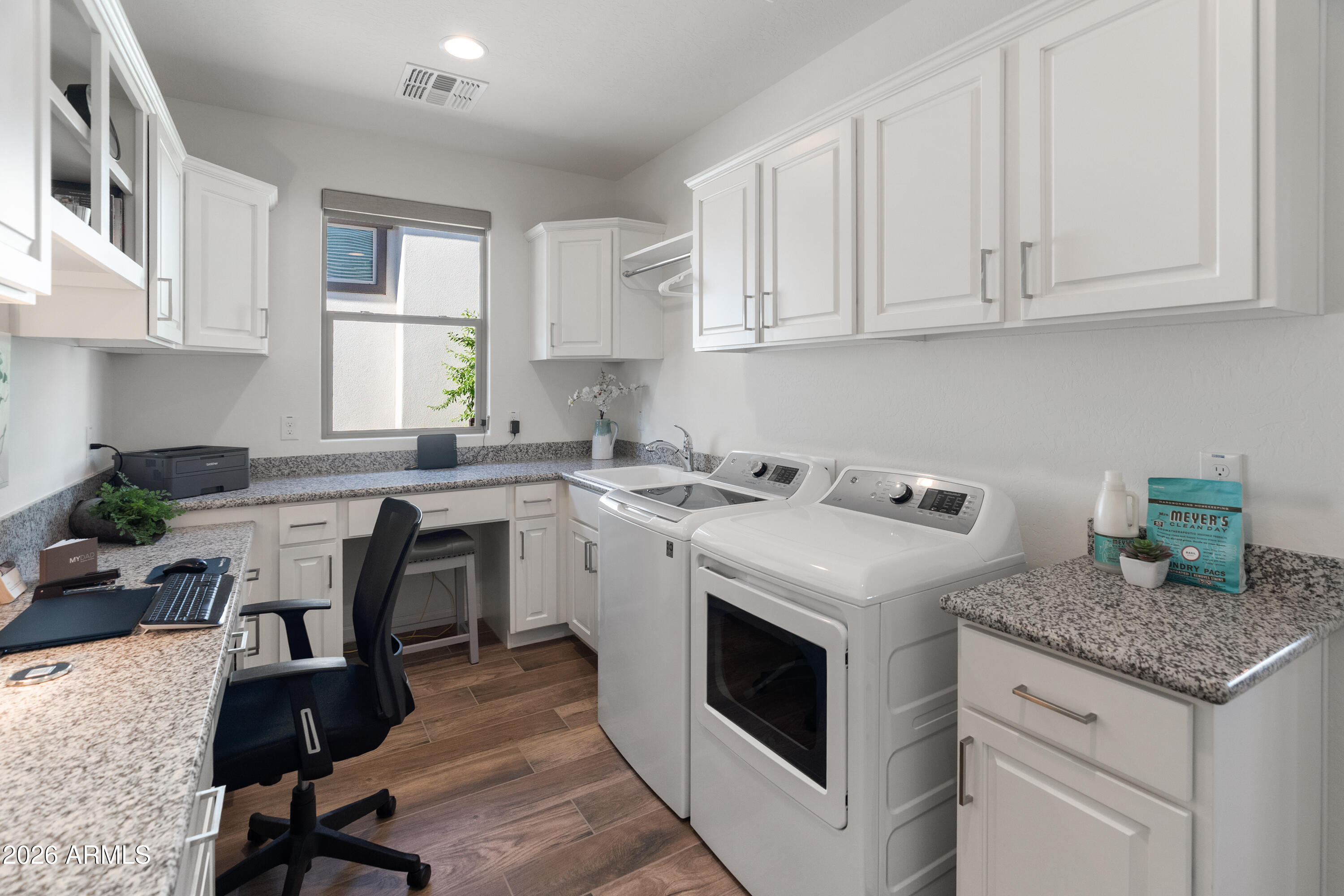 17840 East Paria Canyon Drive Rio Verde, AZ 85263 - Photo 6 of 10 a kitchen with granite countertop white cabinets and white appliances