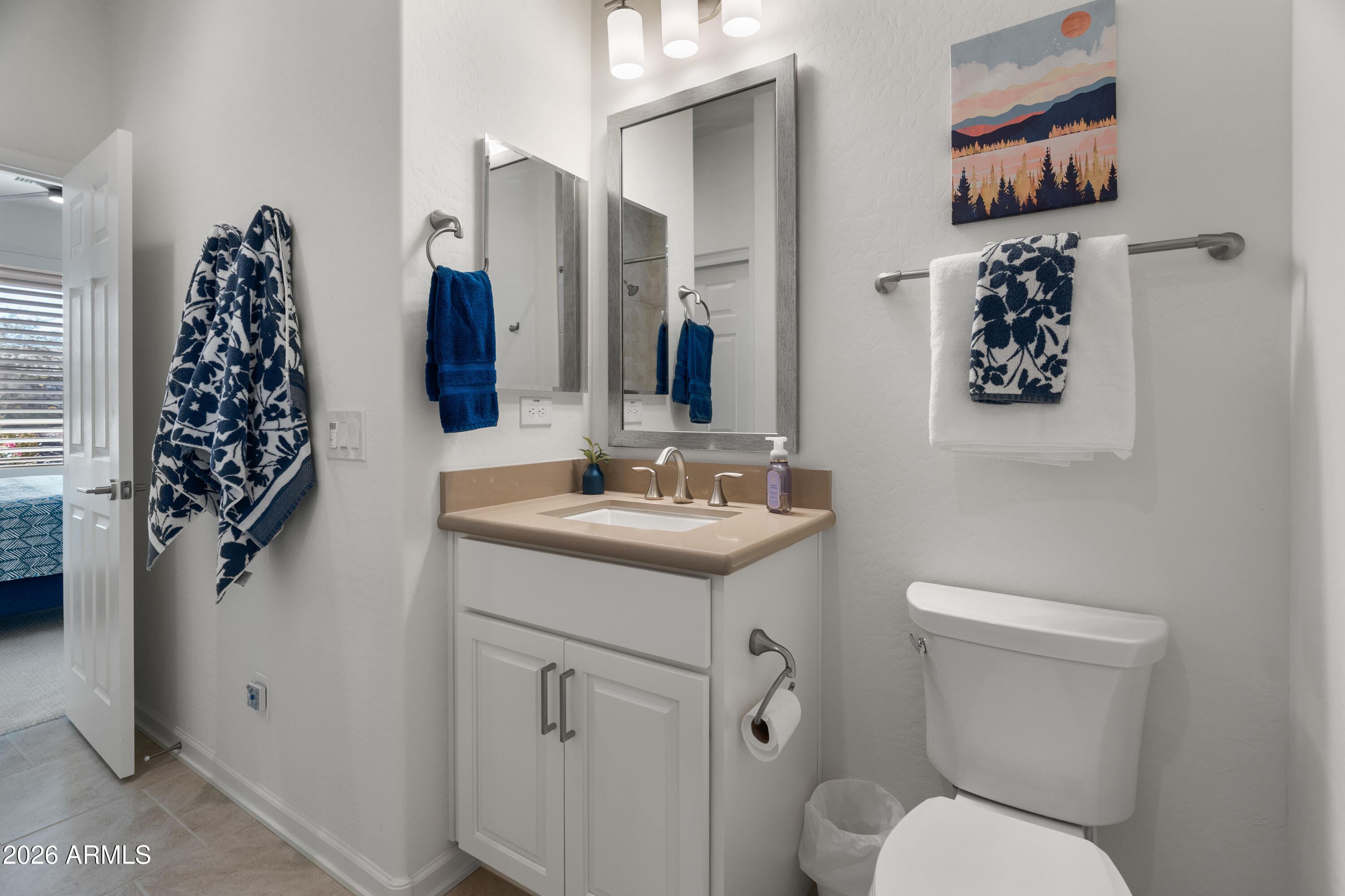 17840 East Paria Canyon Drive Rio Verde, AZ 85263 - Photo 7 of 10 a bathroom with a toilet sink and mirror