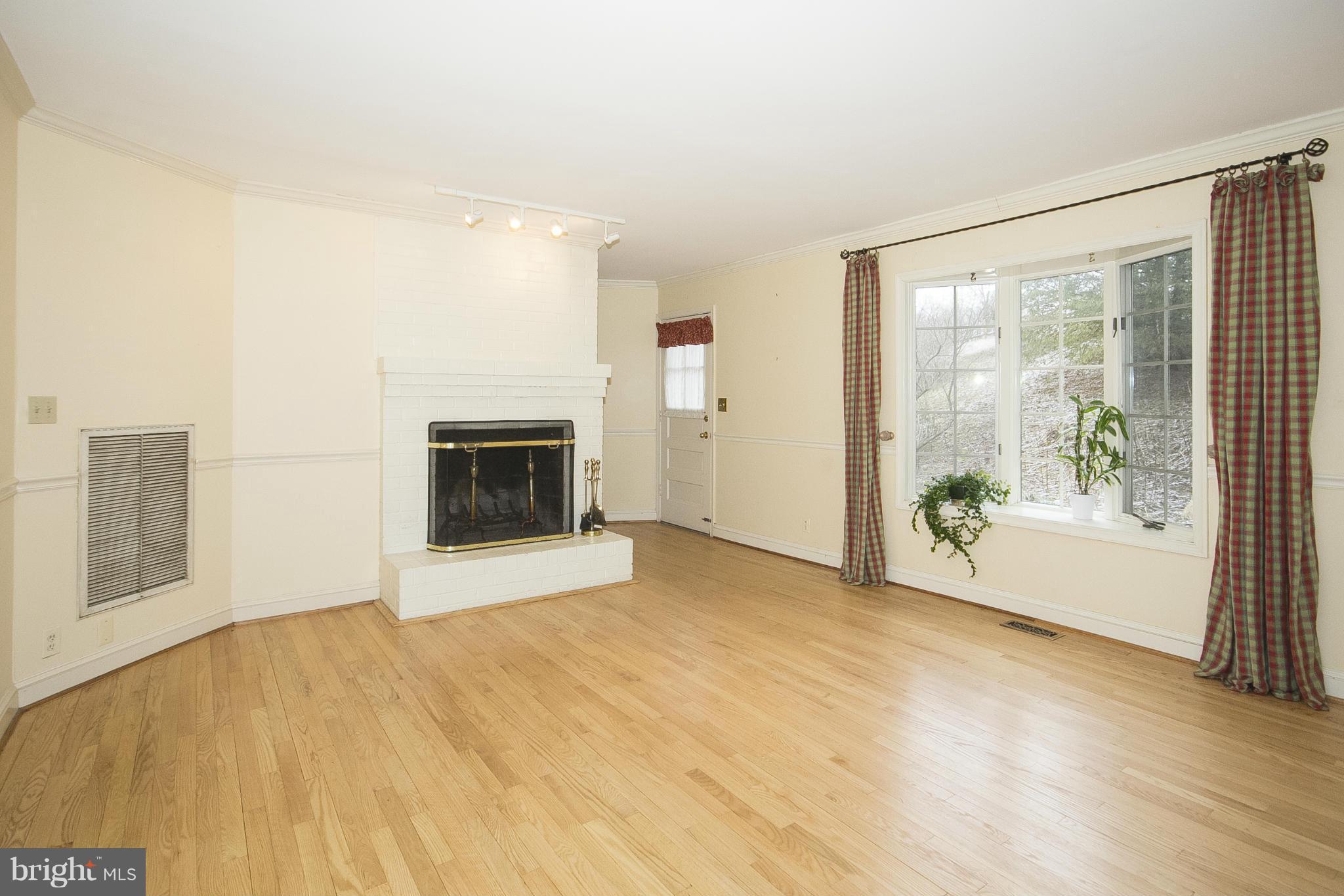2132 Corbett Road Monkton, MD 21111 - Photo 15 of 30 Family Room with wood burning fireplace