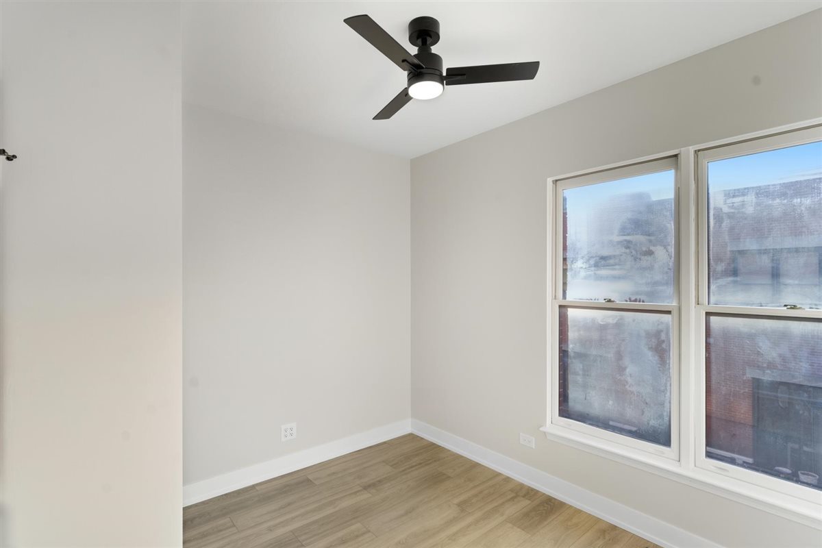 839 West 14th Place Chicago, IL 60608 - Photo 11 of 14 a view of a hallway with a glass door