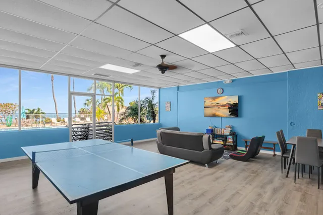 a view of a balcony with furniture