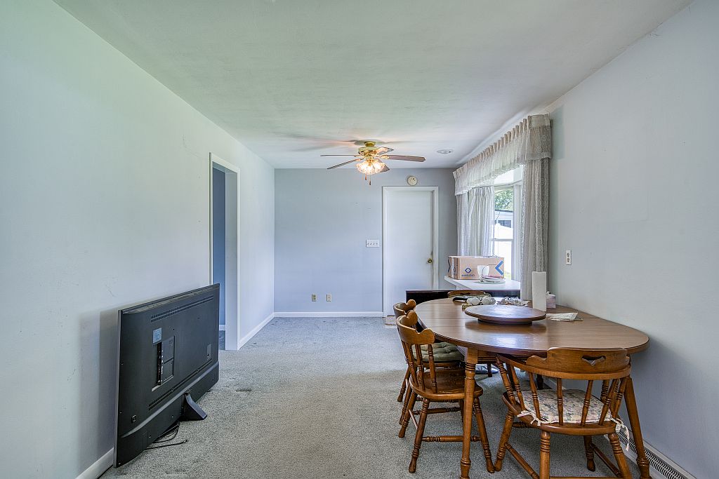 324 Beckenham Road Englewood, OH 45322 - Photo 12 of 26 This versatile space features comfortable carpeting and a bright window, perfect for everyday living.