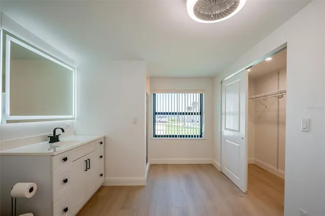 a view of an empty room and window