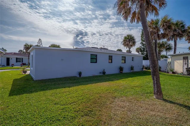 a view of a backyard with a garden