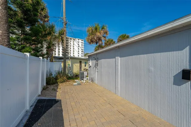 a house view with a garden space