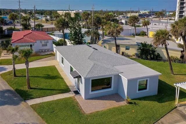 a aerial view of a house with garden