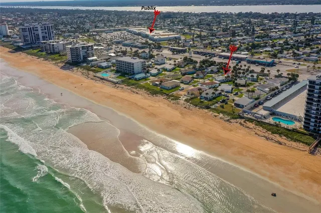 an aerial view of a houses with outdoor space