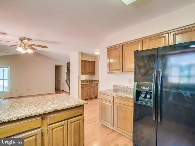 9720 Ironmaster Drive Burke, VA 22015 - Photo 19 of 46 a kitchen with a refrigerator and countertop