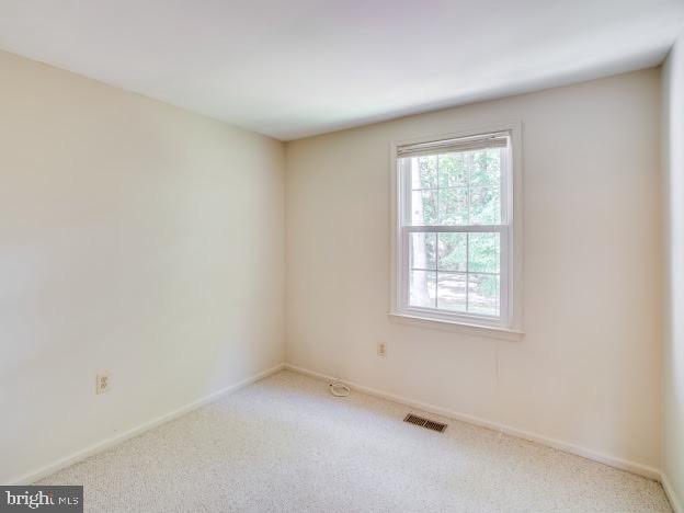 9720 Ironmaster Drive Burke, VA 22015 - Photo 32 of 46 an empty room with a window