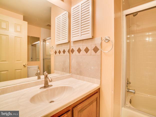 9720 Ironmaster Drive Burke, VA 22015 - Photo 36 of 46 a bathroom with a sink and a mirror