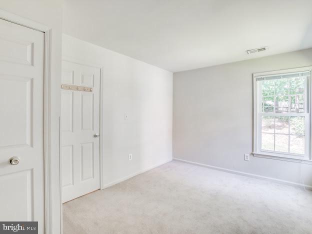 9720 Ironmaster Drive Burke, VA 22015 - Photo 43 of 46 a view of an empty room with a window