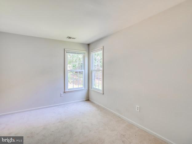 9720 Ironmaster Drive Burke, VA 22015 - Photo 44 of 46 a view of an empty room with windows