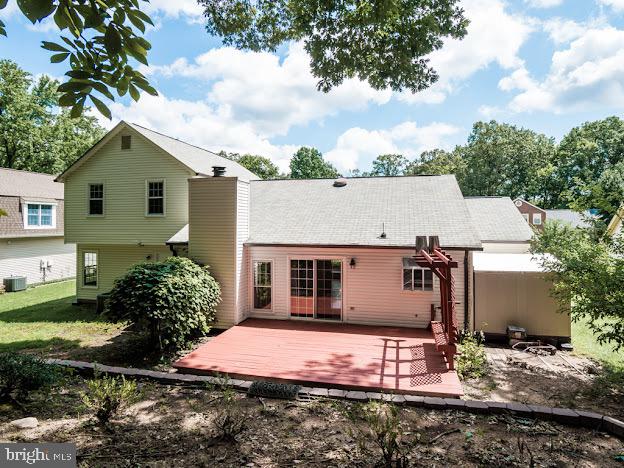 9720 Ironmaster Drive Burke, VA 22015 - Photo 10 of 46 a view of a house with a yard and tree s