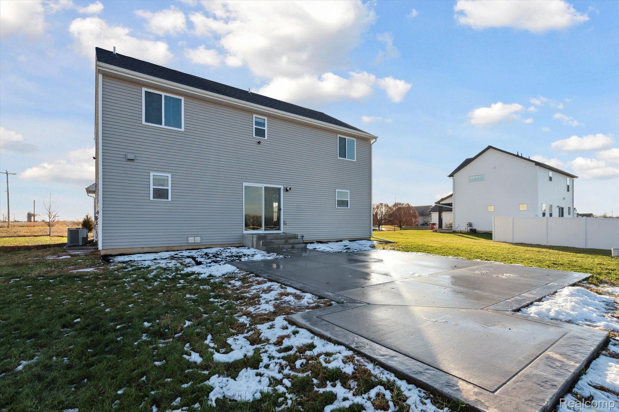 8024 Jordan Drive Jackson, MI 49201 - Photo 35 of 39 Patio off the sliding glass door in Kitchen