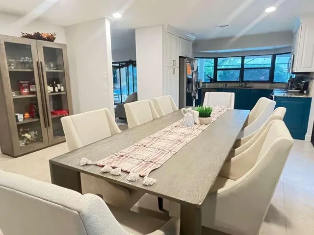 a living room with furniture and window