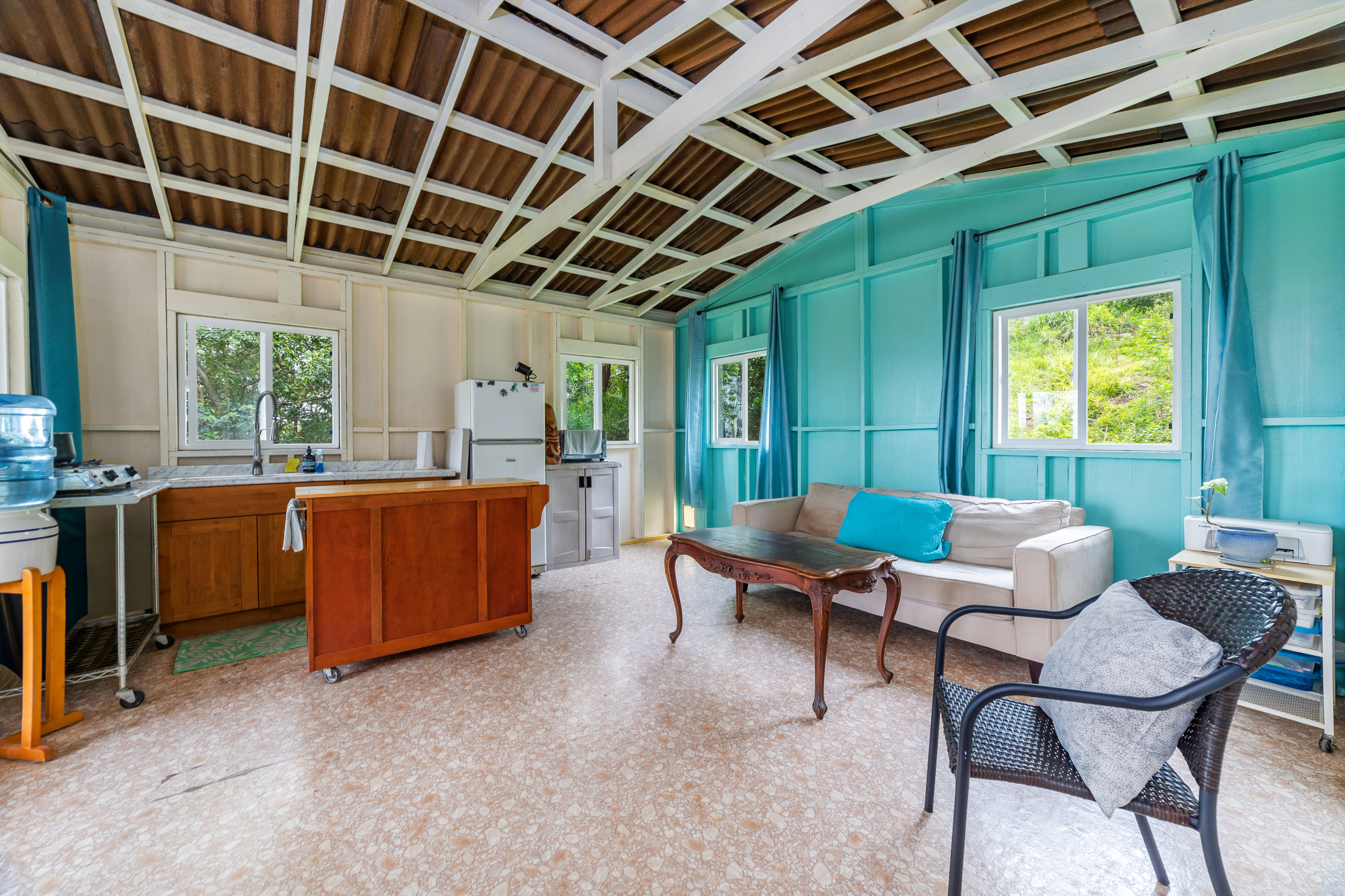 87-1081 Haleili Road Captain Cook, HI 96704 - Photo 7 of 24 a living room with furniture and a large window