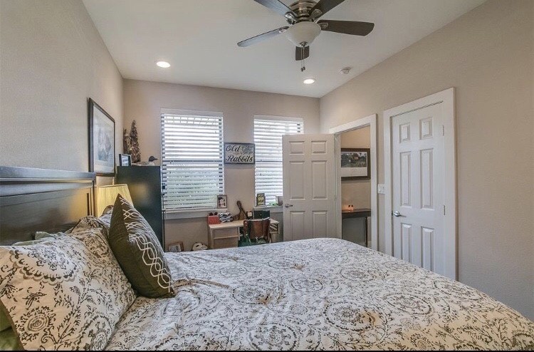 1703 Patterson Street, Unit B Houston, TX 77007 - Photo 12 of 26 a bedroom with furniture and a window