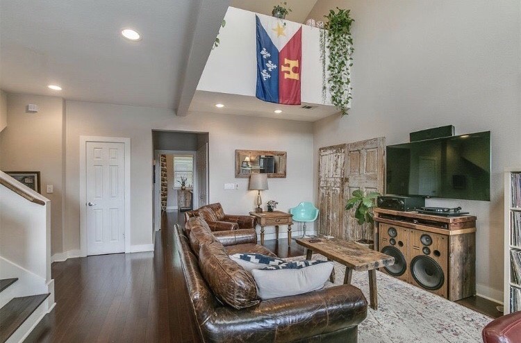 1703 Patterson Street, Unit B Houston, TX 77007 - Photo 7 of 26 a living room with furniture and a flat screen tv