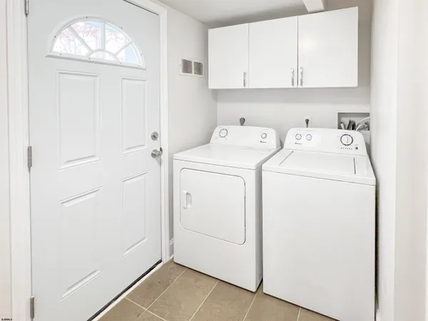 a view of a hallway with a white door