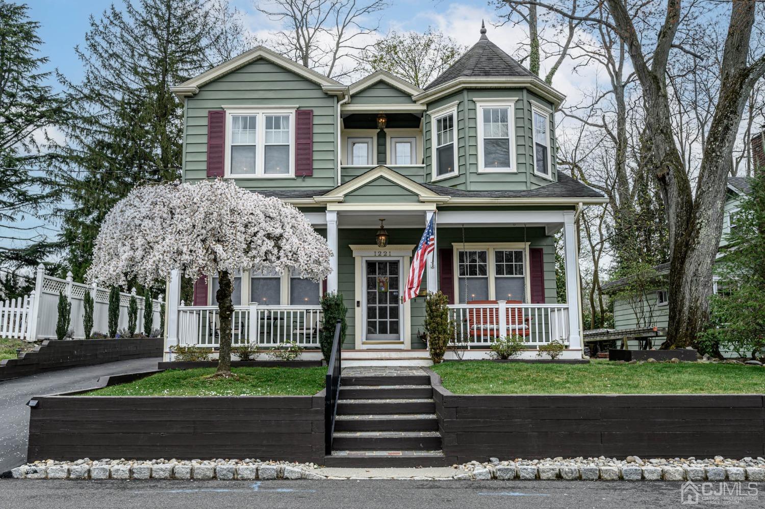 1221 Beech Avenue Mountainside, NJ 07092 - Photo 1 of 46 a front view of a house with a yard
