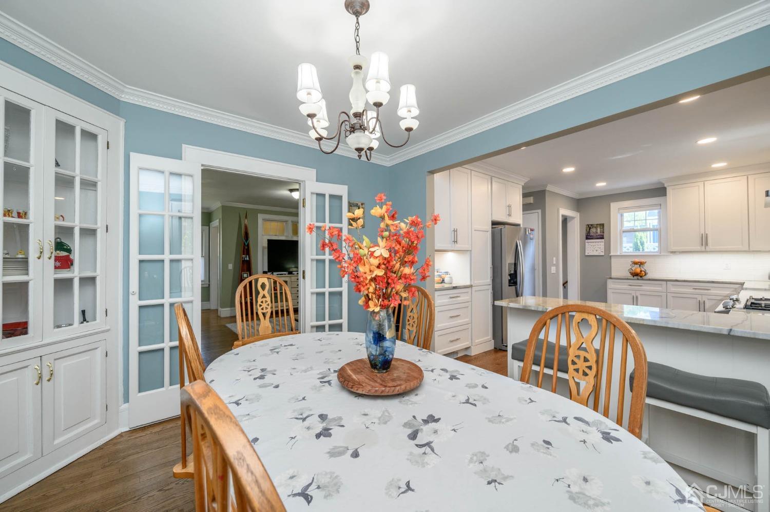 1221 Beech Avenue Mountainside, NJ 07092 - Photo 12 of 46 a view of a dining room with furniture and wooden floor