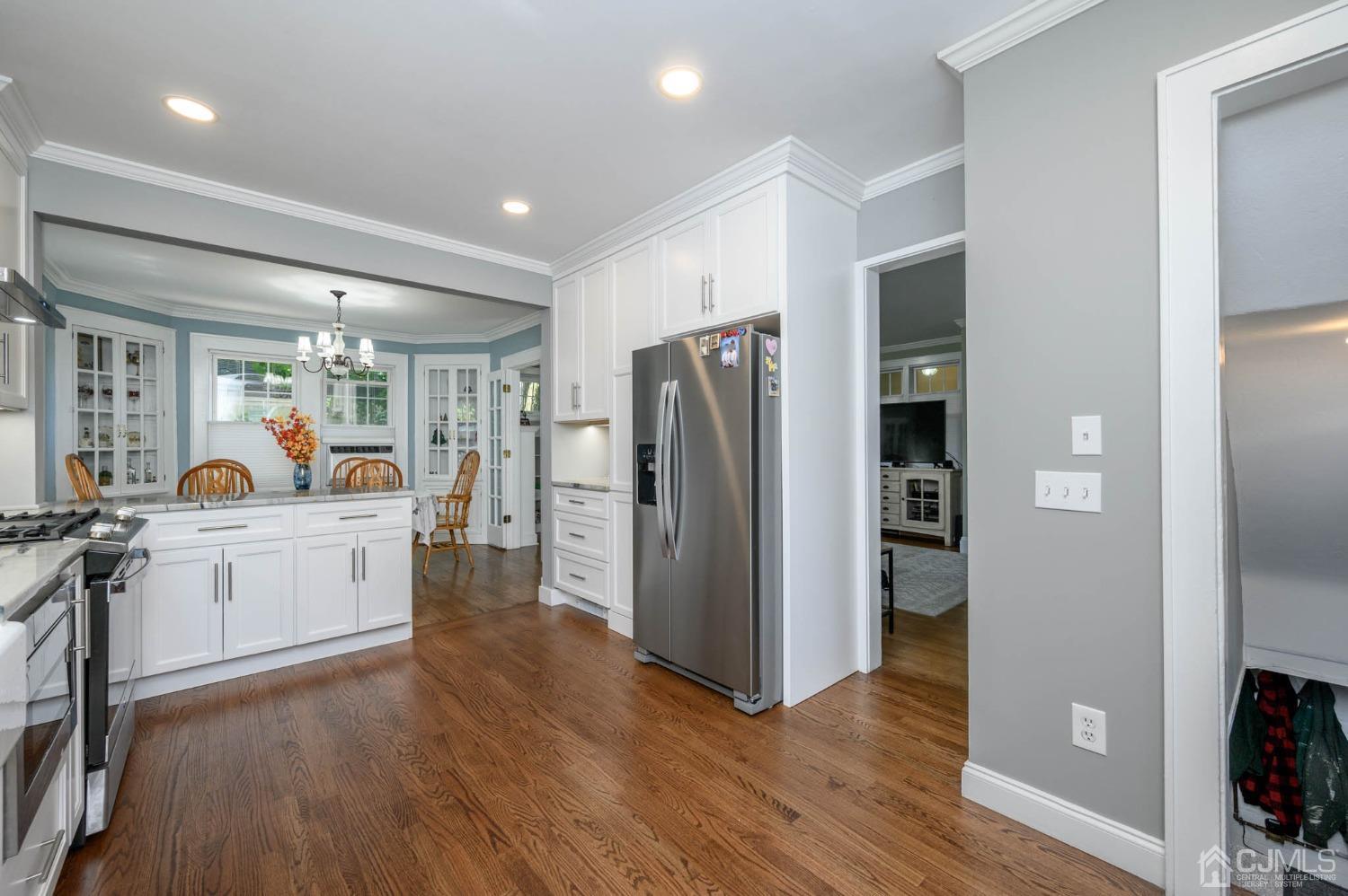 1221 Beech Avenue Mountainside, NJ 07092 - Photo 16 of 46 a large kitchen with a refrigerator and a stove top oven