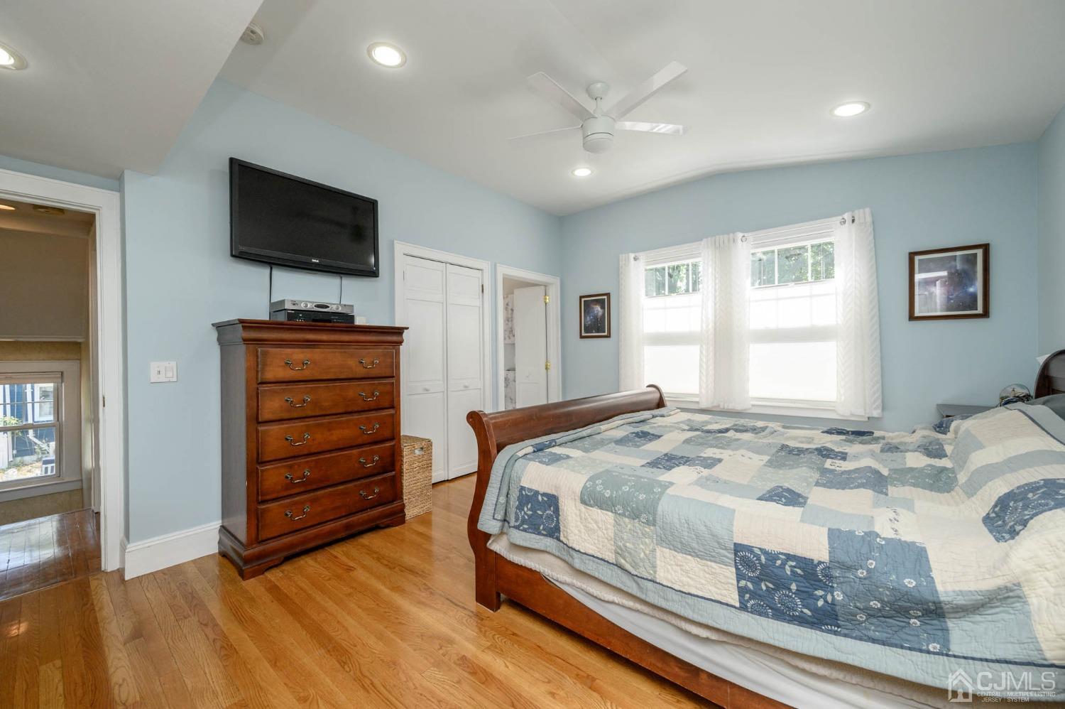 1221 Beech Avenue Mountainside, NJ 07092 - Photo 21 of 46 a bedroom with a bed and a flat screen tv